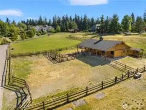 4 stall barn, wood rail fenced and cross fenced pastures, paddocks, storage, additional loafing sheds and outbuildings.