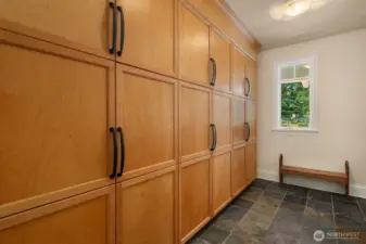 Built-in cubby/cabinetry in mud room area near garage.