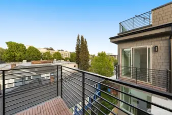 Enjoy fresh air and views from your private outdoor balcony, just steps from your bedroom.