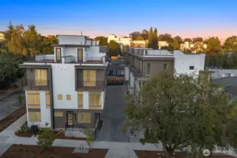 At twilight, the exterior glows with curb appeal, highlighting thoughtful craftsmanship and a collection that feels both private and connected to the neighborhood.