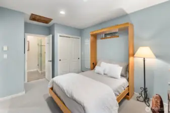 Comfortable main-level guest suite with private 3/4 bath—perfect for visitors seeking privacy and convenience.