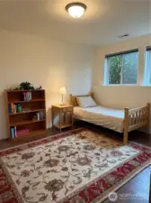 Lower-level bedroom or makes a great office