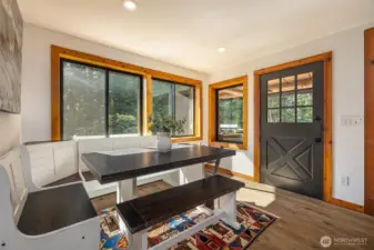 Dining space off the kitchen, with the deck through the door on the right.
