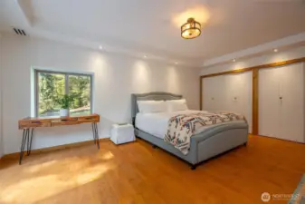 Lower level bedroom suite with ensuite bathroom.