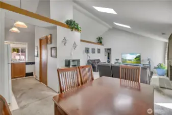 Open-concept dining and living space with great sightlines throughout. Such a wonderful, bright and open feel!