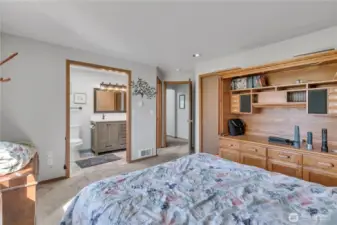 Here is another view of the primary bedroom looking into the adjacent remodeled bathroom. The walk-in closet is on the right as you enter the room.