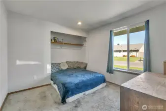 The secondary bedroom is large and there is ample space for dressers, etc.