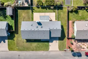 Top-down view of home footprint and yard configuration.