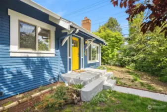 Welcome to your charming, light-filled bungalow that exudes old-world charm with modern comforts, on a large, corner lot in the desirable Greenwood neighborhood