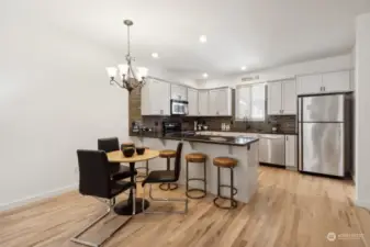 Kitchen has a breakfast bar for four.