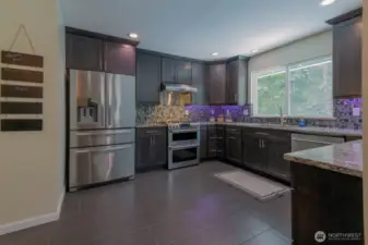 Updated kitchen with granite counters and all appliances stay.