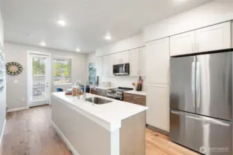 Photos are of community model home in a similar plan.