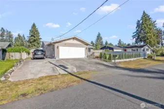 Side access for Boat, or RV Parking, with Shed style storage located near by. Also easy access to garage and driveway.