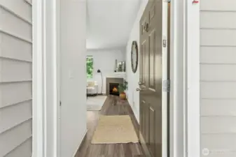 Enter into your unit with vinyl plank flooring.