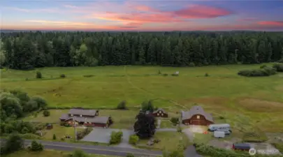 Experience peaceful country living with breathtaking views from this custom home overlooking 36 majestic acres.