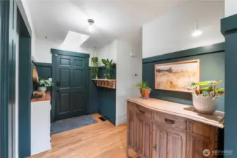 The skylight in the entry sets the tone as you step into this stunning custom-designed home.