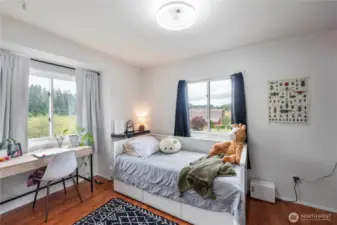 Upstairs junior suite with mountain view, its own private bath, and walk-in closet.
