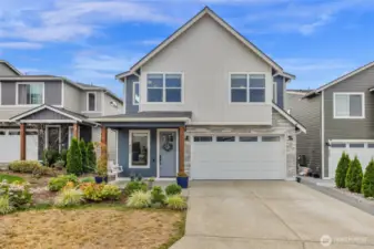 Front of home with extended driveway