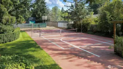 This beautifully maintained tennis court provides an excellent setting, not only for competitive games, but also serves as an ideal venue for hosting enjoyable social gatherings, lively events, and memorable community functions.
