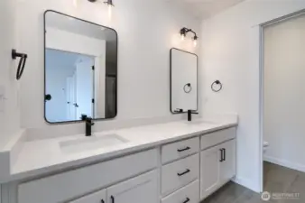 Upstairs Primary Bathroom - Features and colors may differ.