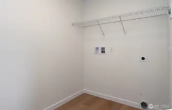 Upstairs Utility Room - Features and colors may differ.