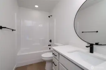 Upstairs Guest Bathroom - Features and colors may differ.