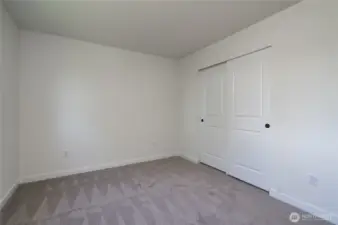 Upstairs Guest Bedroom - Features and colors may differ.