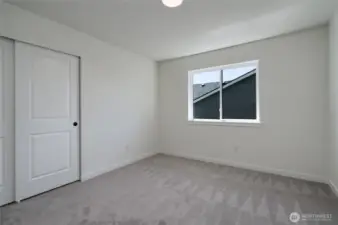 Upstairs Guest Bedroom - Features and colors may differ.
