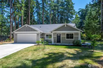 This house has it all! single story featuring an easy-access layout suited for aging in place, landscaped yard, quiet neighborhood, and level, cleared nearly 1/2 acre of beautiful island living.
