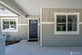 Tongue and groove ceiling is an elegant entryway! The cement plank siding makes this house low maintenance.