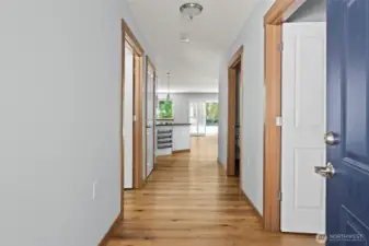 The elegant foyer, beautiful vinyl plank flooring throughout the entire home.