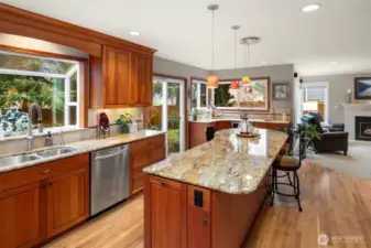 Garden window overlooks backyard and pond