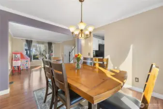 Large dining room with lots of natural light opens to 2nd living room