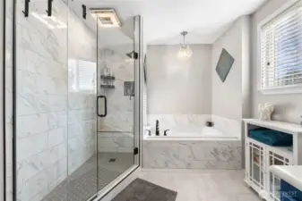 Tiled walk-in shower and soaker tub