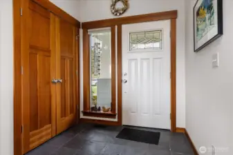 Entry way - home has solid doors!