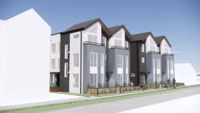 Immerse yourself in the stylish and modern facade of Lotus II townhomes. Each residence features a unique blend of textures and clean lines, offering a contemporary look that stands out in the Whittier Heights neighborhood.