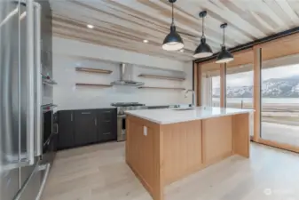 Main floor kitchen with large nesting sliding door