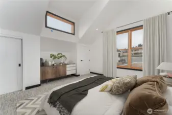Virtually staged - Upstairs second primary bedroom with ensuite bathroom with heated floors and walk in shower