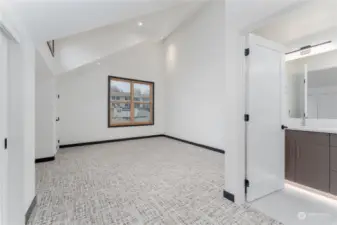 Upstairs second primary bedroom with bathroom