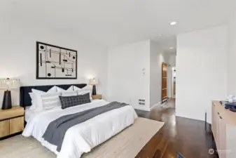 A custom wood barn door separates this floor from the rest of the house.