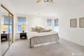 Primary bedroom with king size bed.