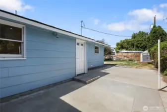 Back patio - exterior door that goes into mudroom with kitchen, garage or downstairs access