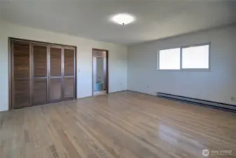 Primary bedroom is spacious and has two closets