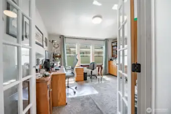 French doors lead to the office off the kitchen