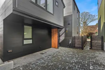 Off-street and partially covered, dedicated parking with E/V charger (included)