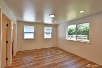 Spacious primary bedroom with walk-icloset and full bath