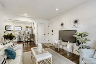 Open concept looks into kitchen/dining area