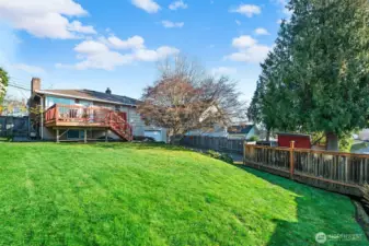 The large fenced yard is a great place to catch some summer sun and let your dog roam.