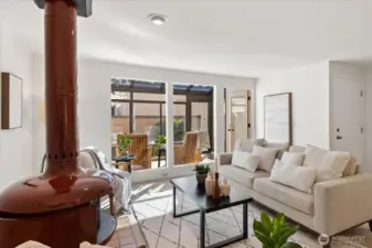 Living room with cozy woodburning fireplace
