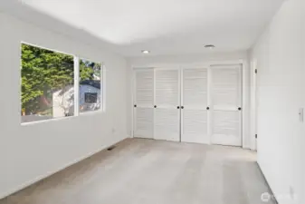 Wall of closets in the 2nd bedroom